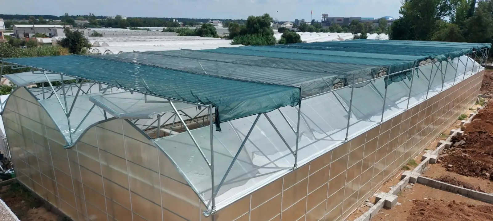 External Curtain Greenhouse Installation